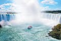 Exclusive First on the Boat Niagara Falls Tour & Journey Behind the Falls