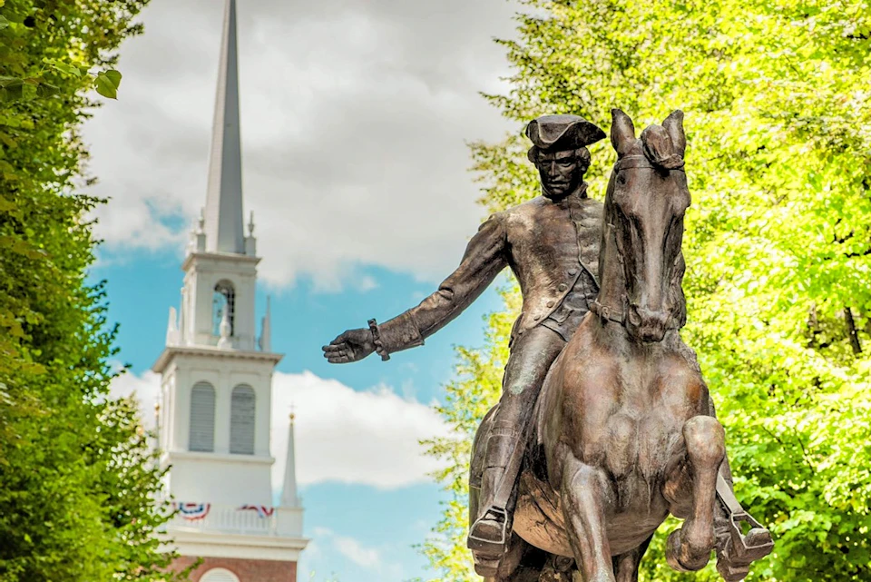 Paul Revere on his Midnight Ride in front of The Old North Church