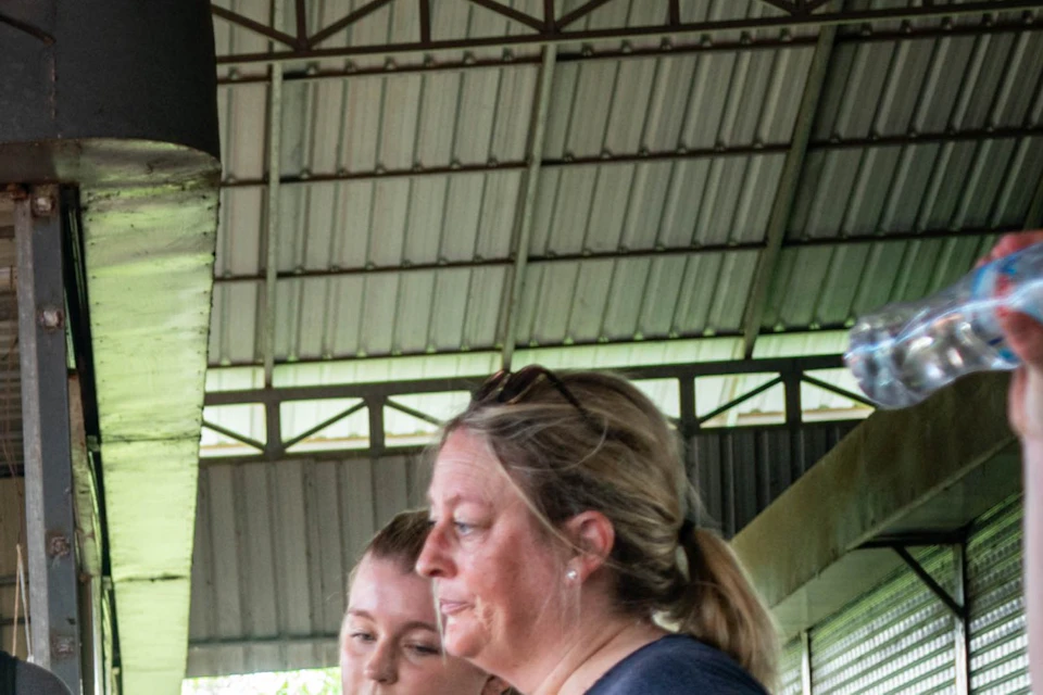 Explore the local market to understand their daily life.