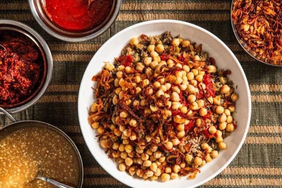 Koshari is Egypt's national dish blending Indian, Italian, and Middle Eastern flavors