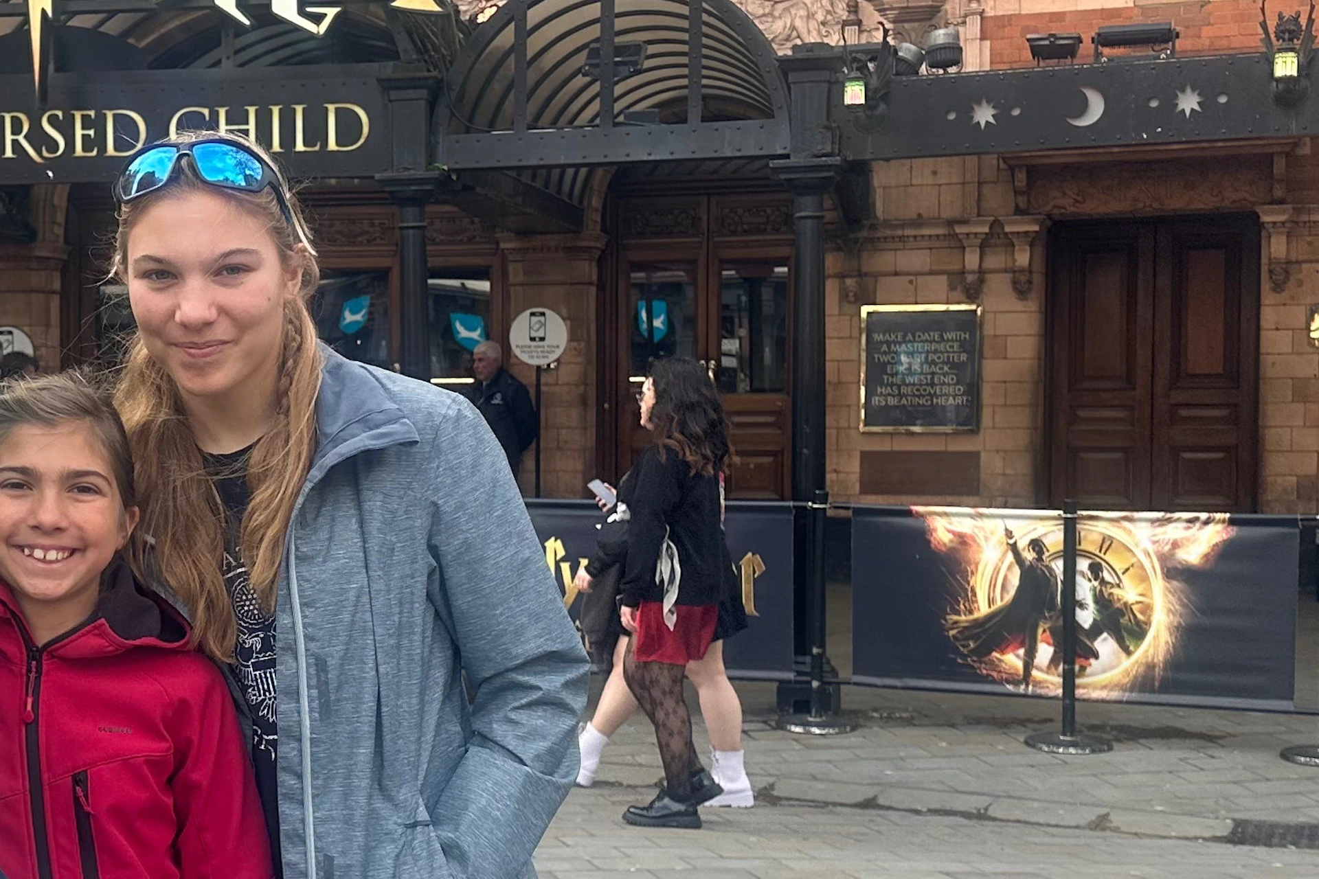 Family outside theatre