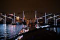 Ammira i bellissimi ponti di Amsterdam illuminati con l'arte