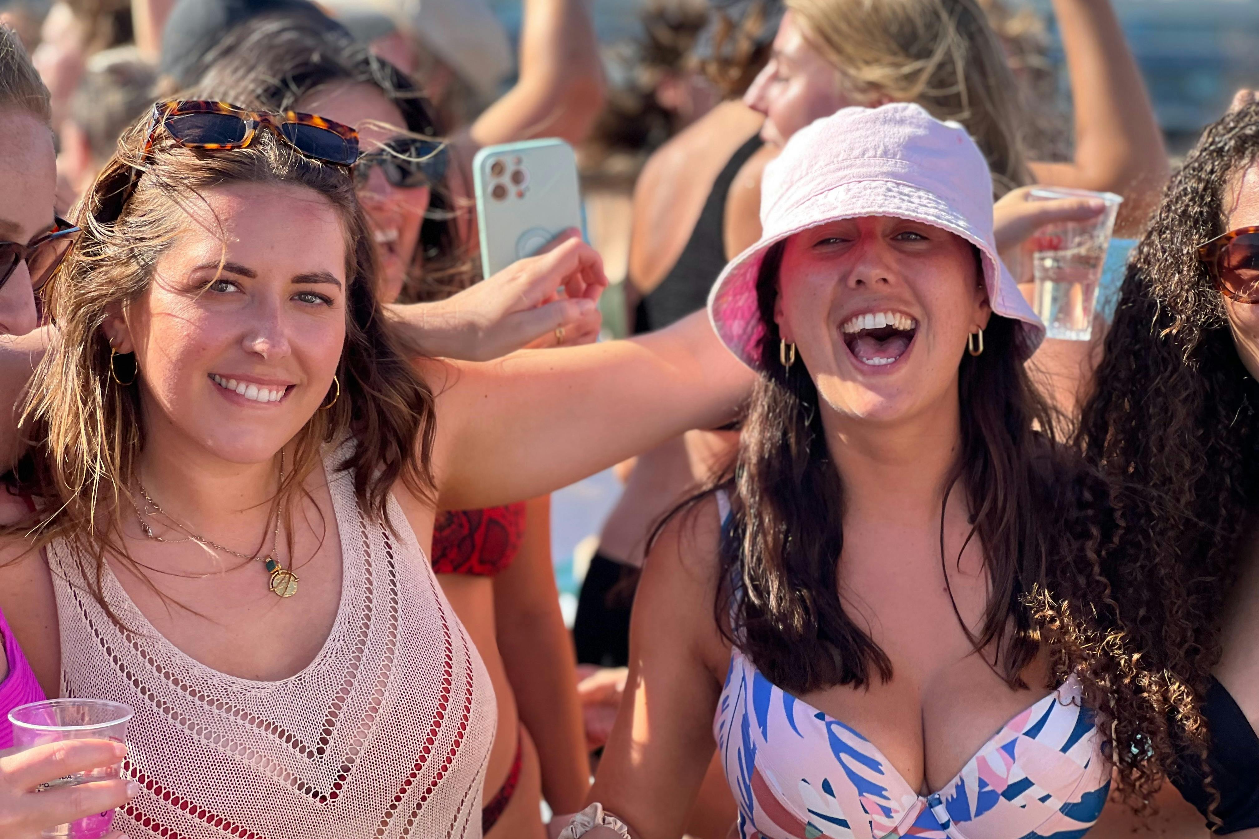 2 girls having fun at a boat party Lisbon
