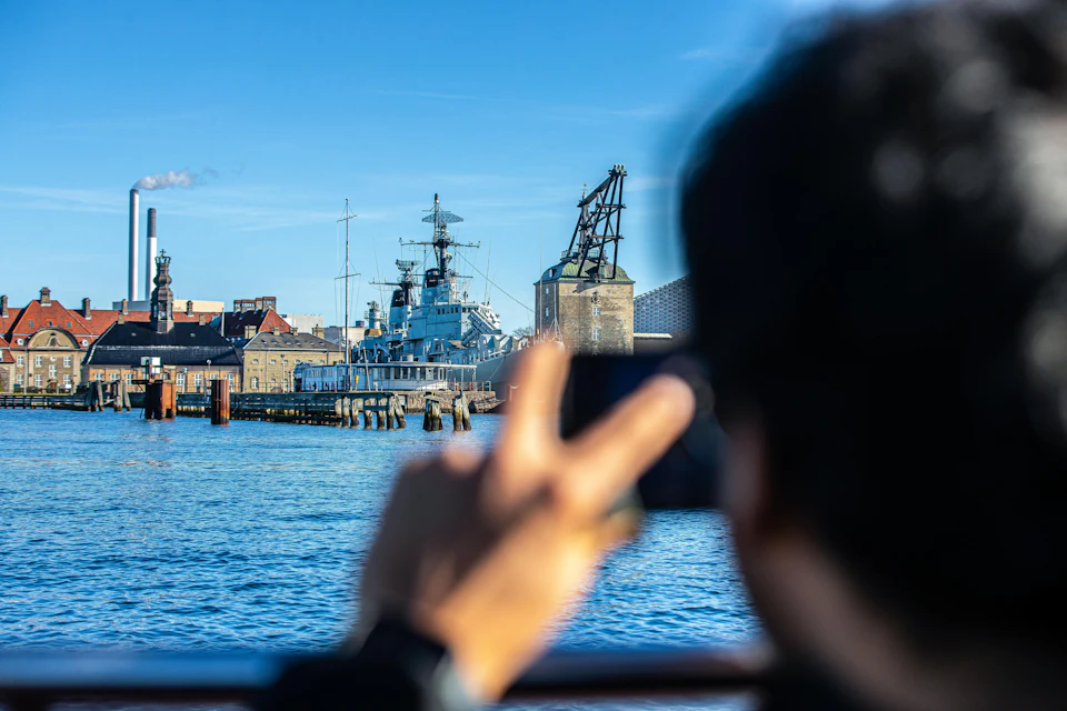 Guest on board the Grand Canal Tour capturing the beauty of Copenhagen's sights.
