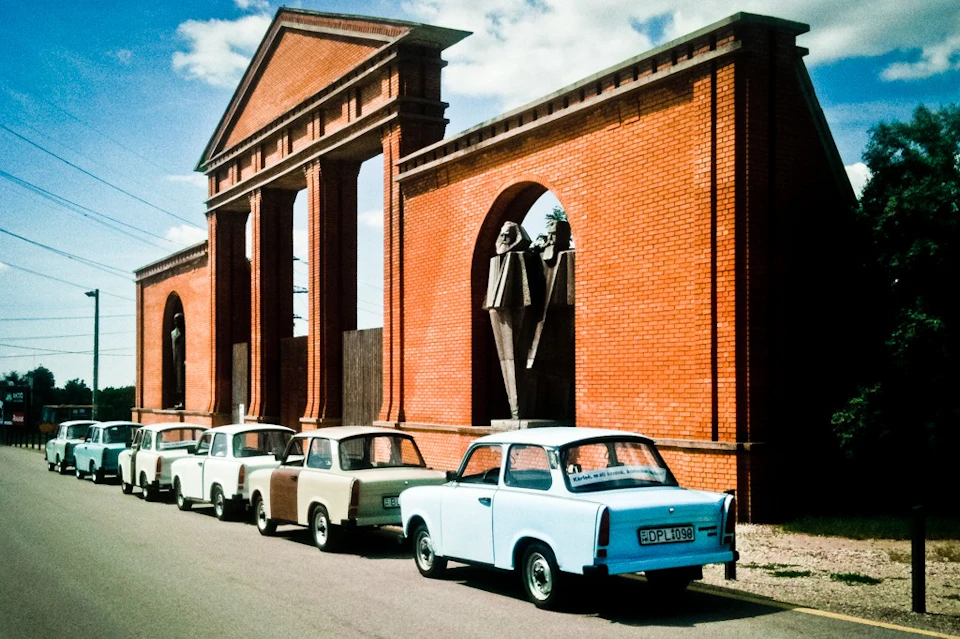 Trabants at the Culisse Wall, the main entrance of Memento Park