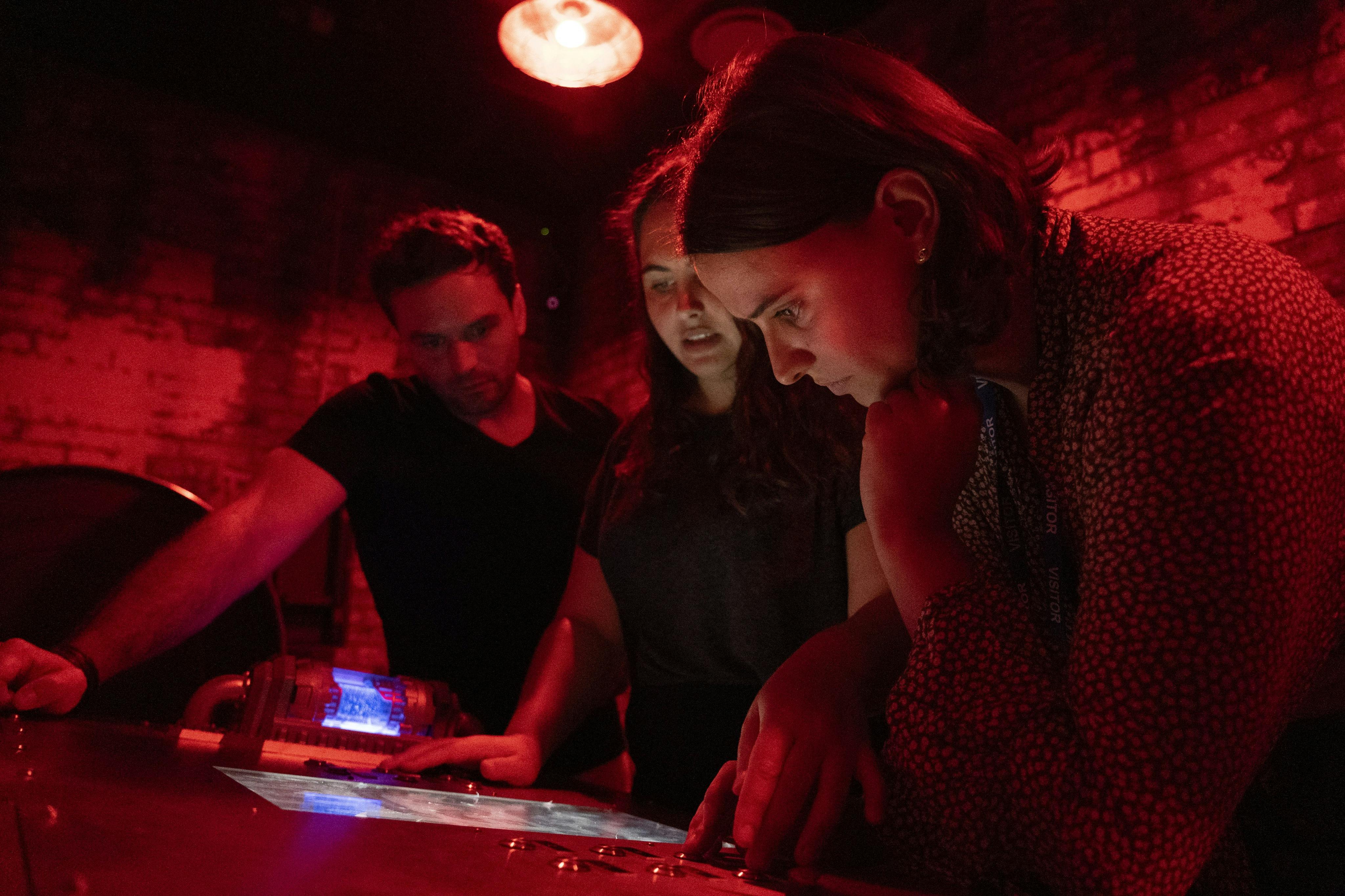 Group of people solving the Joker's challenge