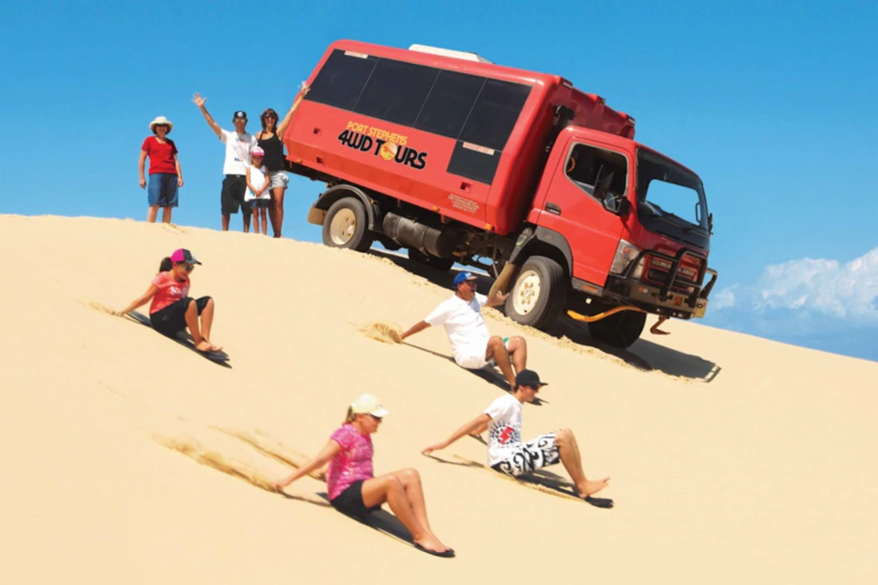 Experience sandboarding with your family and friends!