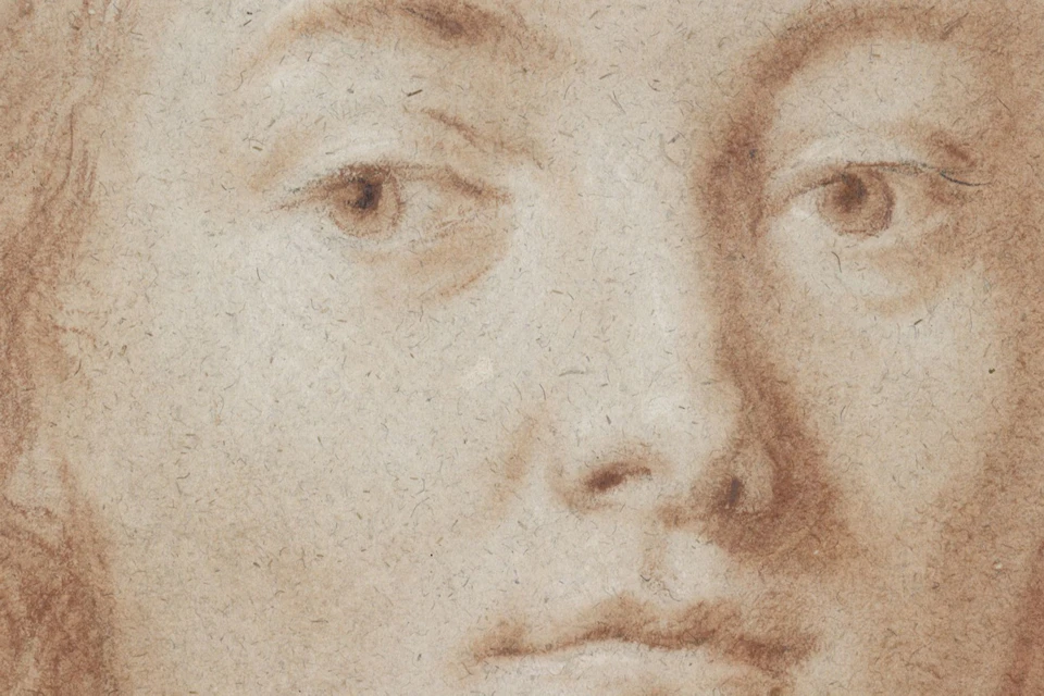 A detailed, close-up sketch of a person's face, showing soft features, straight hair, and a neutral expression.