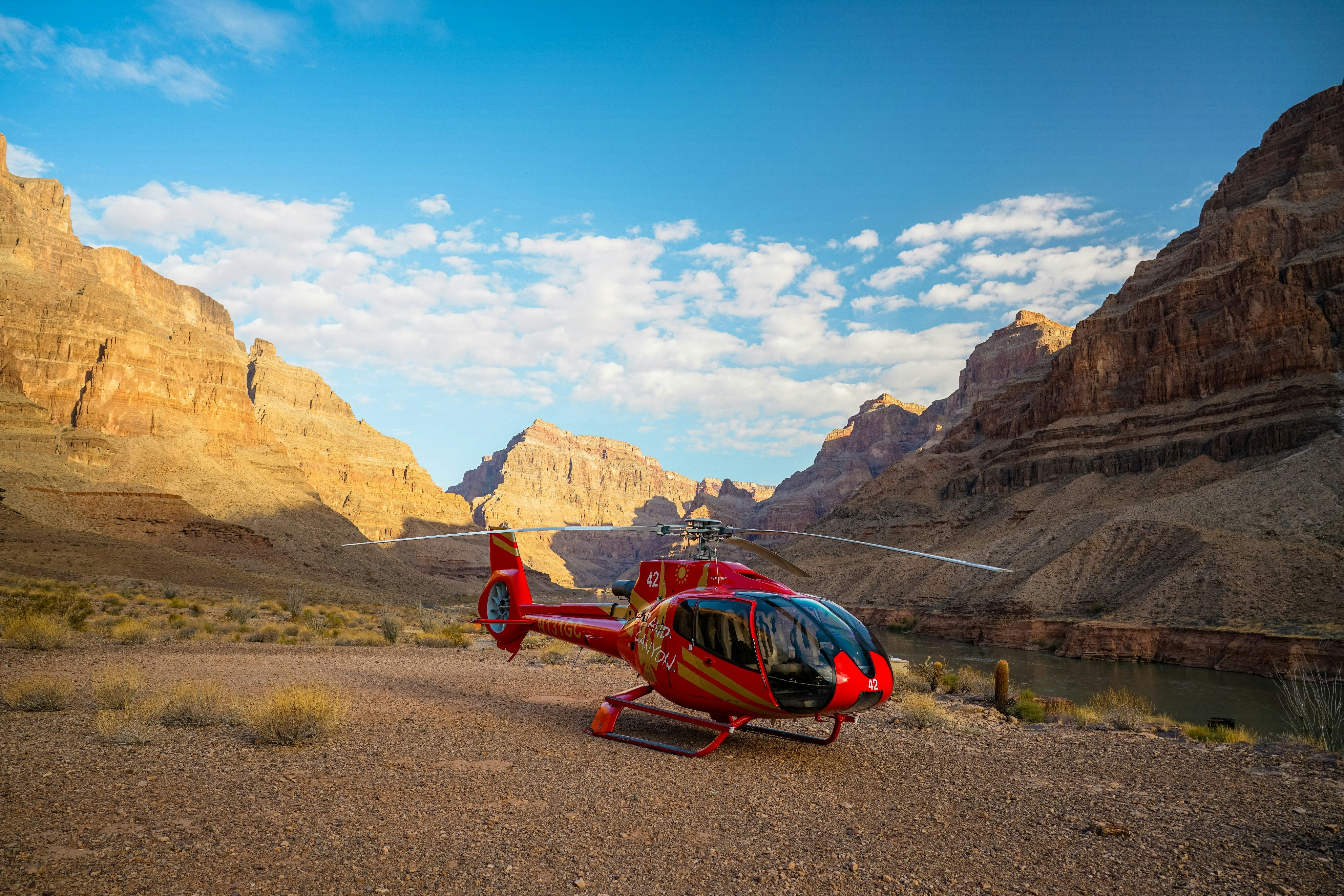 Grand Canyon: Sunset Helicopter Tour with Canyon Floor Landing + Champagne