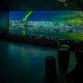 Auroras Boreales sobre Islandia en una pantalla panorámica de 7 metros en un cine
