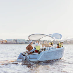 Enjoy a private electric picnic boat on Lake Burley Griffin in Canberra