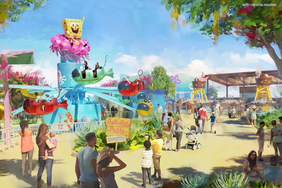 A lively family-friendly outdoor park with colorful attractions, playful structures, and people enjoying the space.