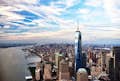 aerial view of new york city and the one world observatory tower