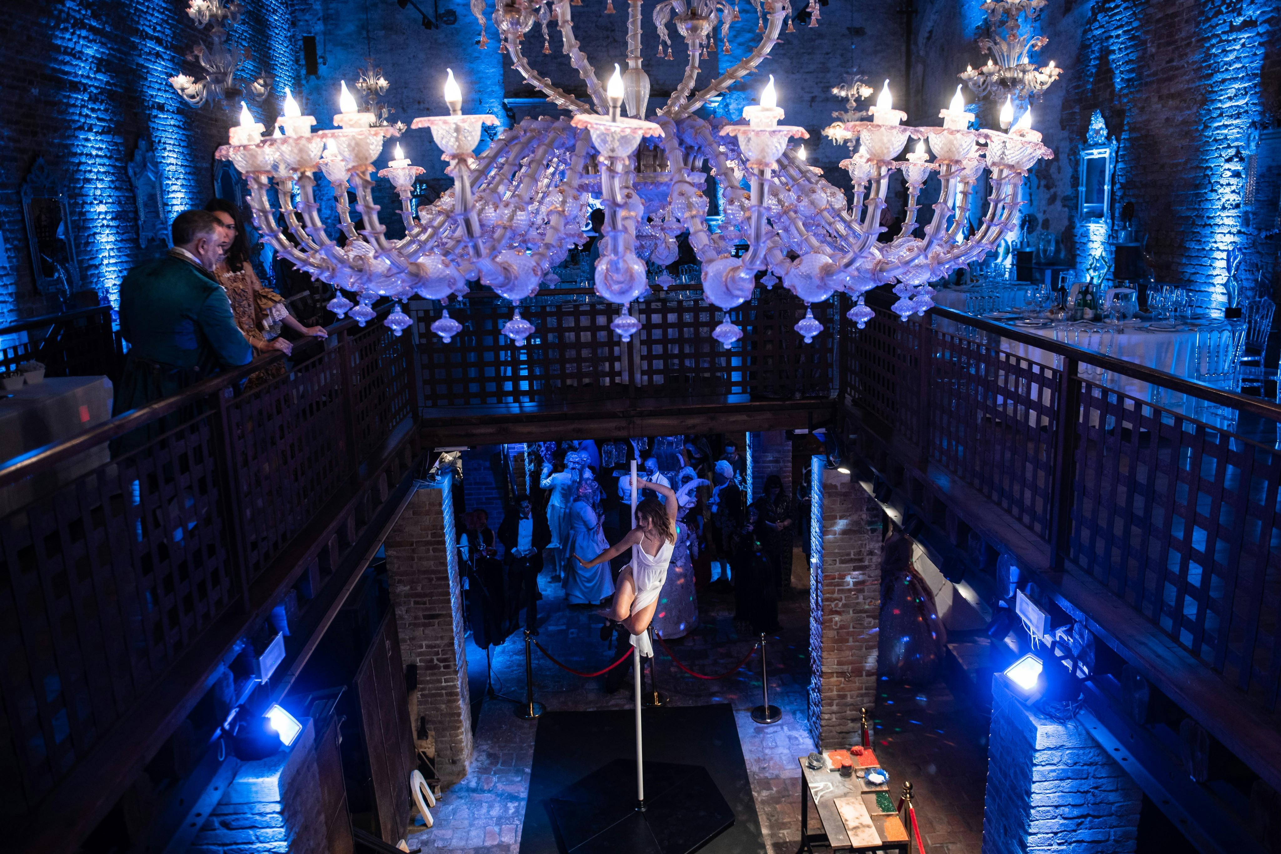 A pole dance performance during the evening