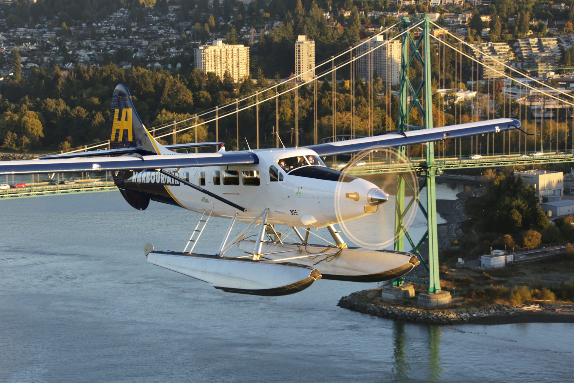 A seaplane tour with the Lions Gate Bridge in the background.