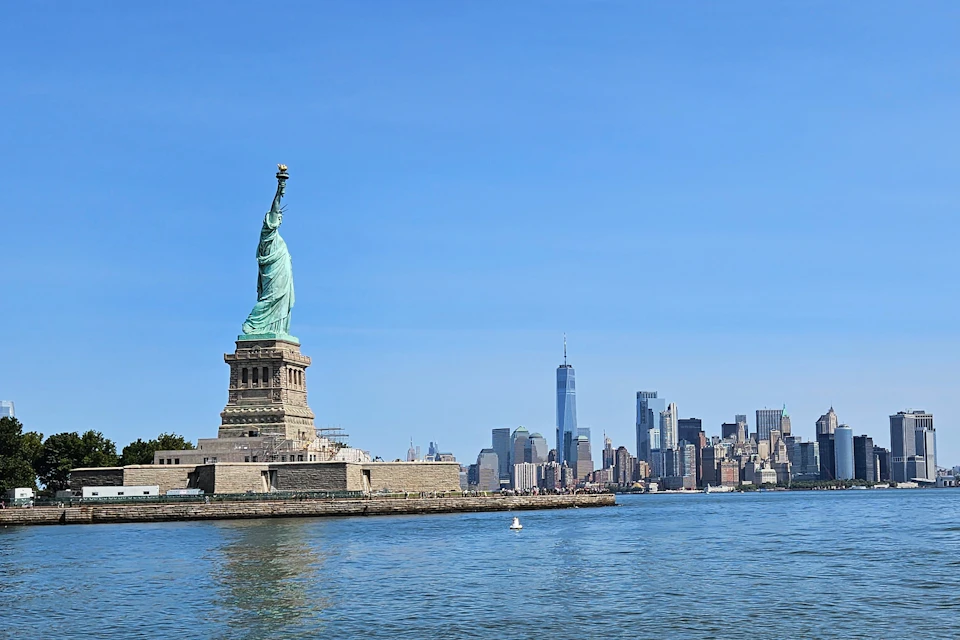 Take in views across New York Harbor with the Statue of Liberty and the Manhattan Skyline