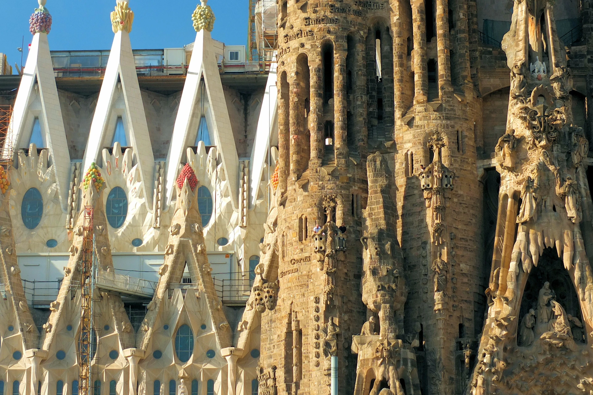 Close-up of ornate architectural details of a cathedral with spires, intricate carvings, and decorative elements.