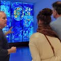 Guide showing Chagall's America Windows