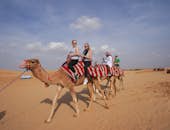 Ranní pouštní safari: jízda na velbloudech, sandboarding a arabská káva a rande