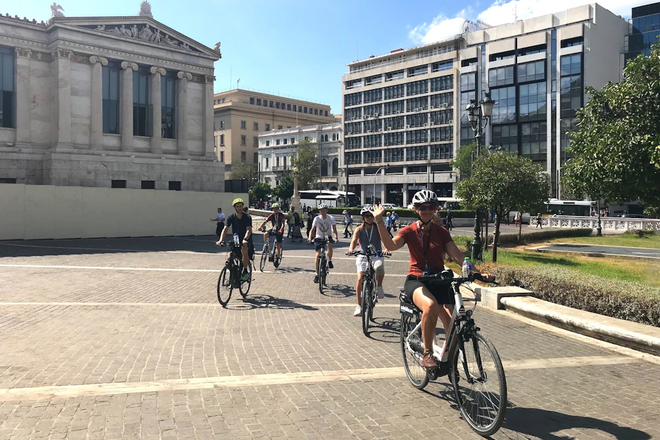 Group of riders passing through the Athenian Trilogy