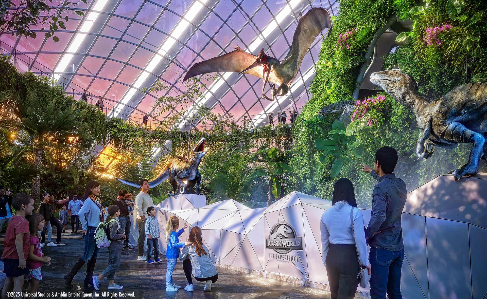 People observe animatronic dinosaurs in a futuristic, glass-ceilinged exhibit with lush plants and the "Jurassic World" logo.