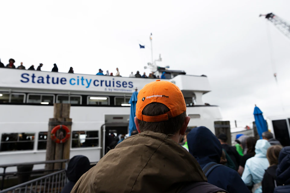 Guide in front of cruise entrance