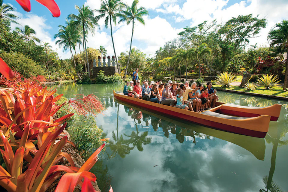 tourists on a barge at Polynesian Cultural Centre in Oahu island