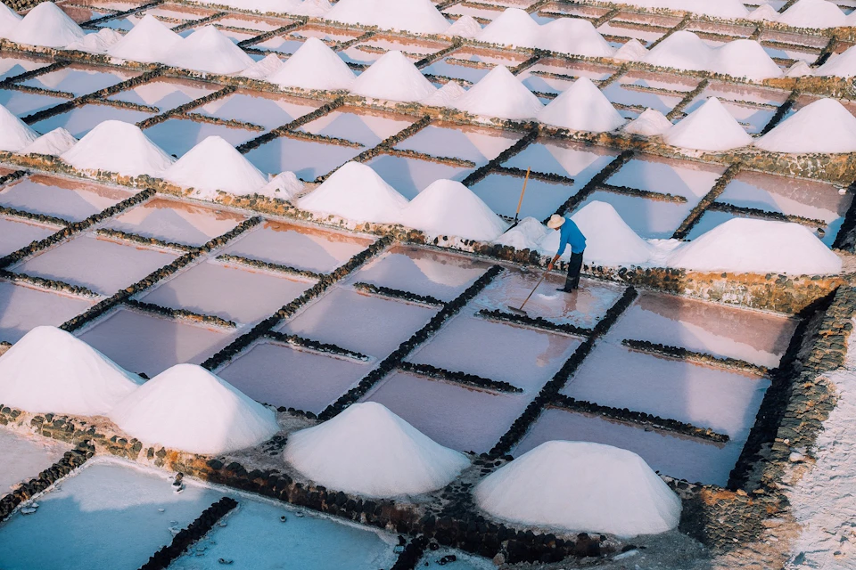 View from the water mill of the salt maker at work in Salinas de Janubio.