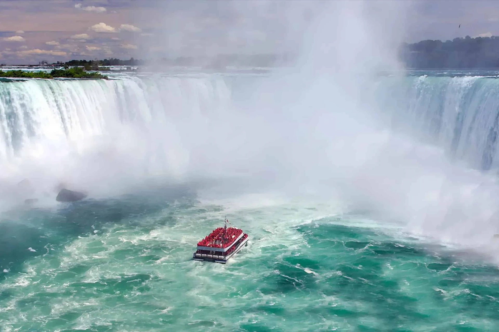 The Hornblower Boat Cruise entering the fog of the Canadian Horseshoe Waterfalls