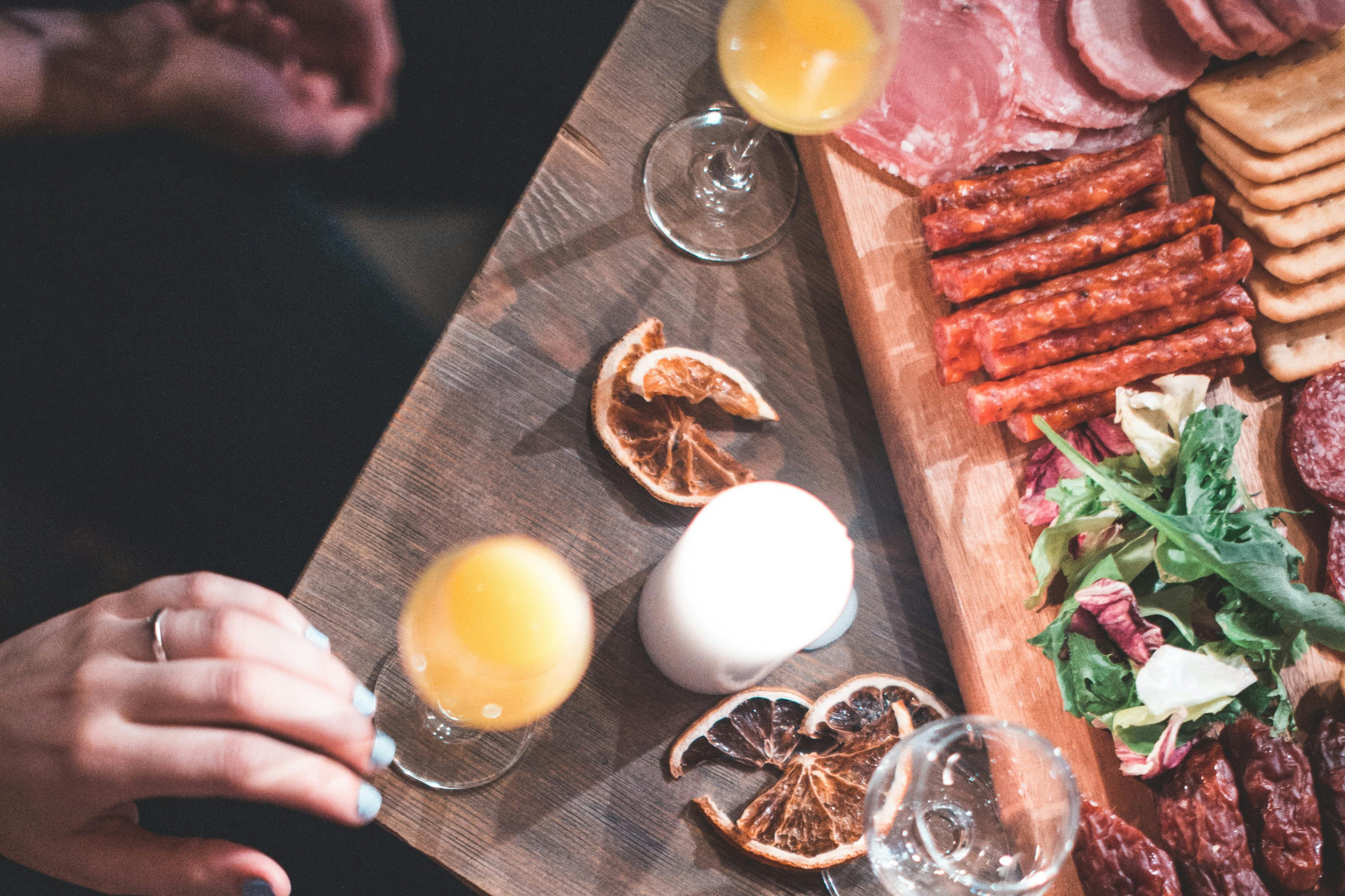 Flavored vodkas alongside Polish tapas in a candlelit venue