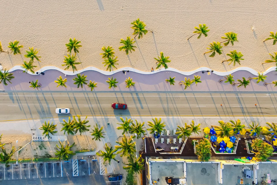 Aerial photo of a road next to the beach