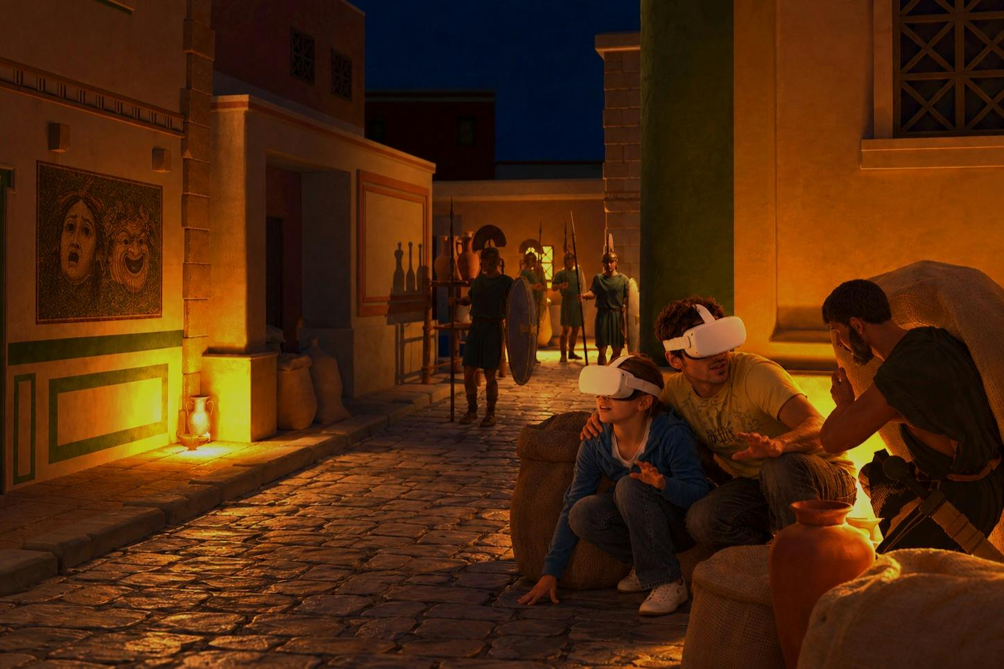 Two people wearing VR headsets sit on sacks in an ancient-style street scene, with virtual figures in the background.