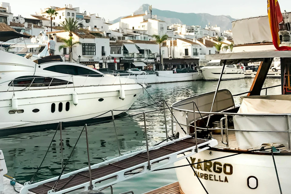 Luxury yachts moored at Puerto Banús, Marbella’s famous marina.