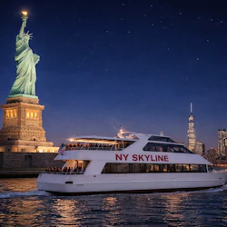 A boat labeled 'NY SKYLINE' cruises near the Statue of Liberty at night, with a city skyline and a starry sky in the background.