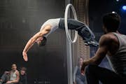 An acrobat leaps through a hoop in “Dear San Francisco.”