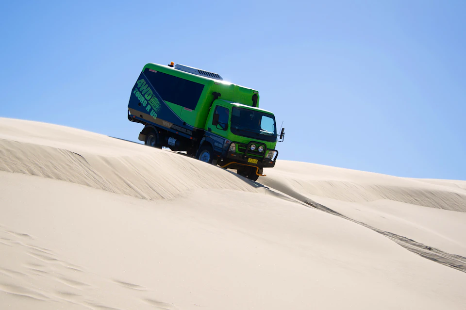 Ride in one of our awesome vehicles on the sloping dunes