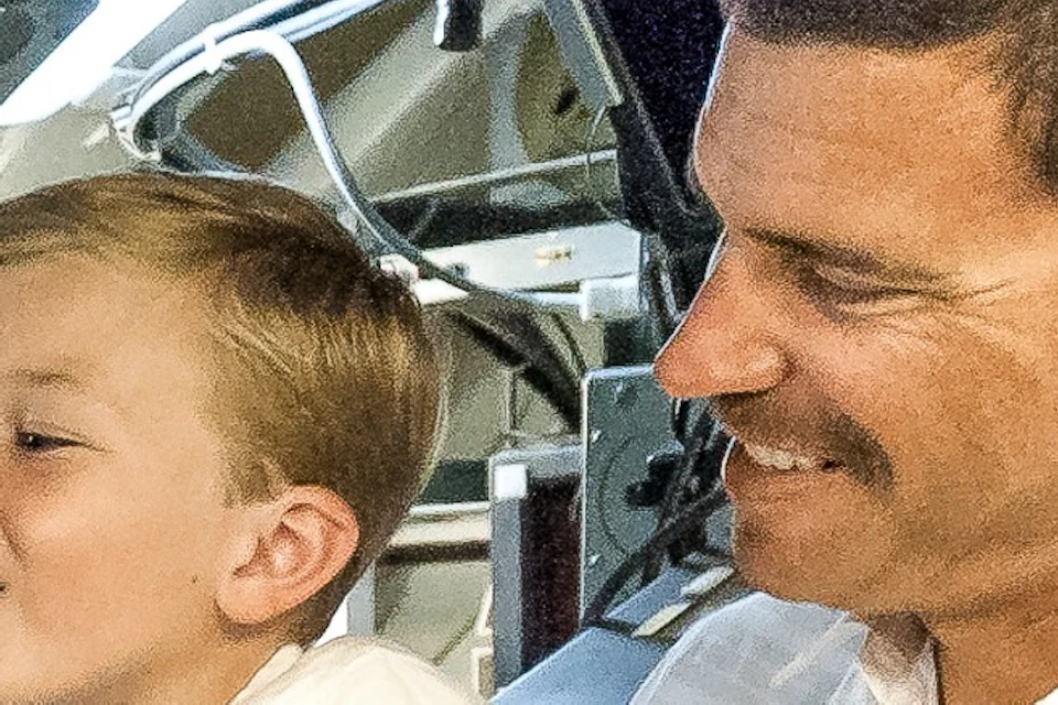 Family enjoys the adventure of stepping into the USS Dolphin submarine at the Maritime Museum of San Diego.
