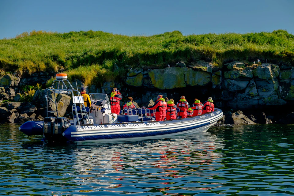 A rib boat near one of the Puffin Islands