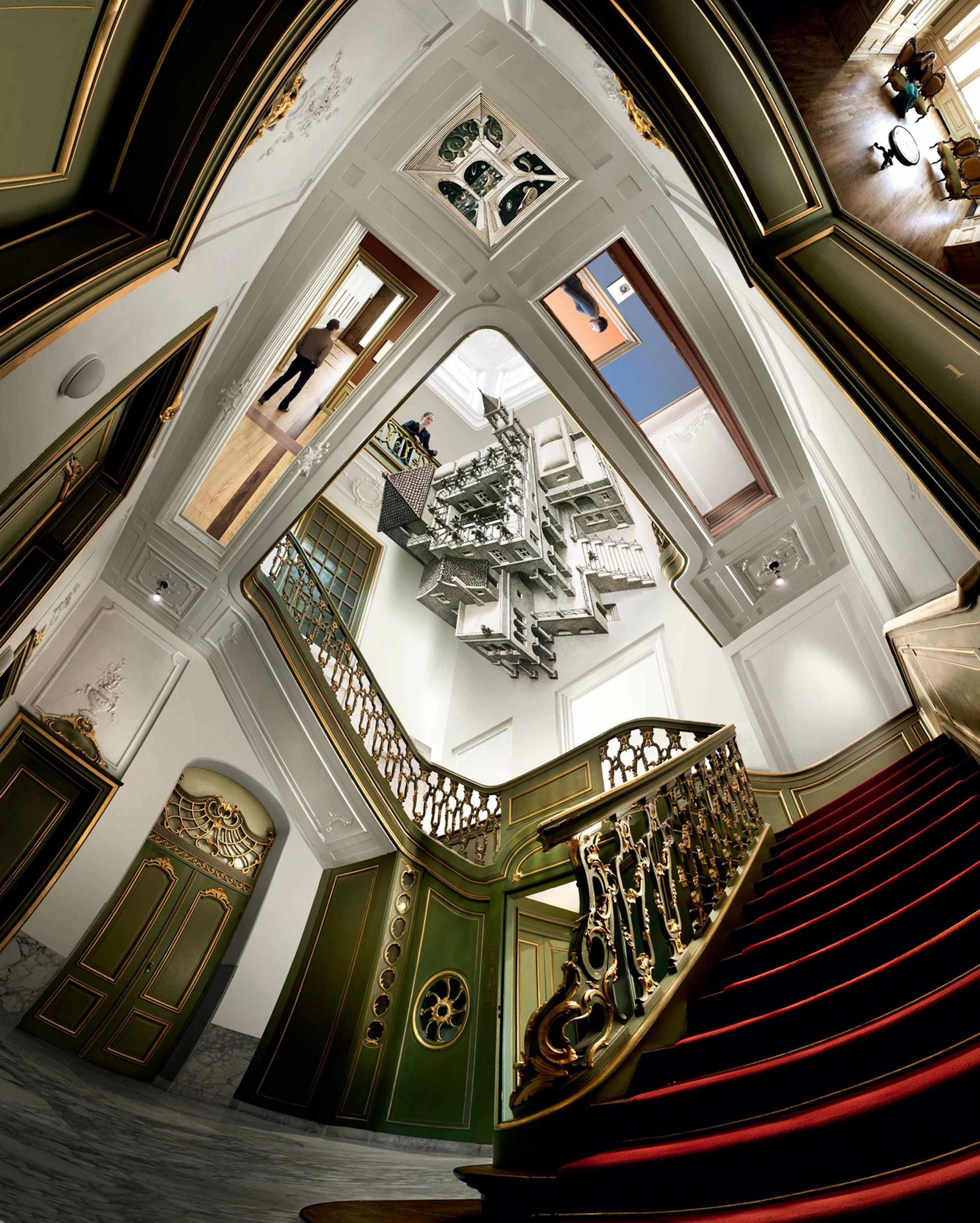 A surreal hallway with warped perspectives, ornate staircases, and a person in the background walking through a door on the ceiling.