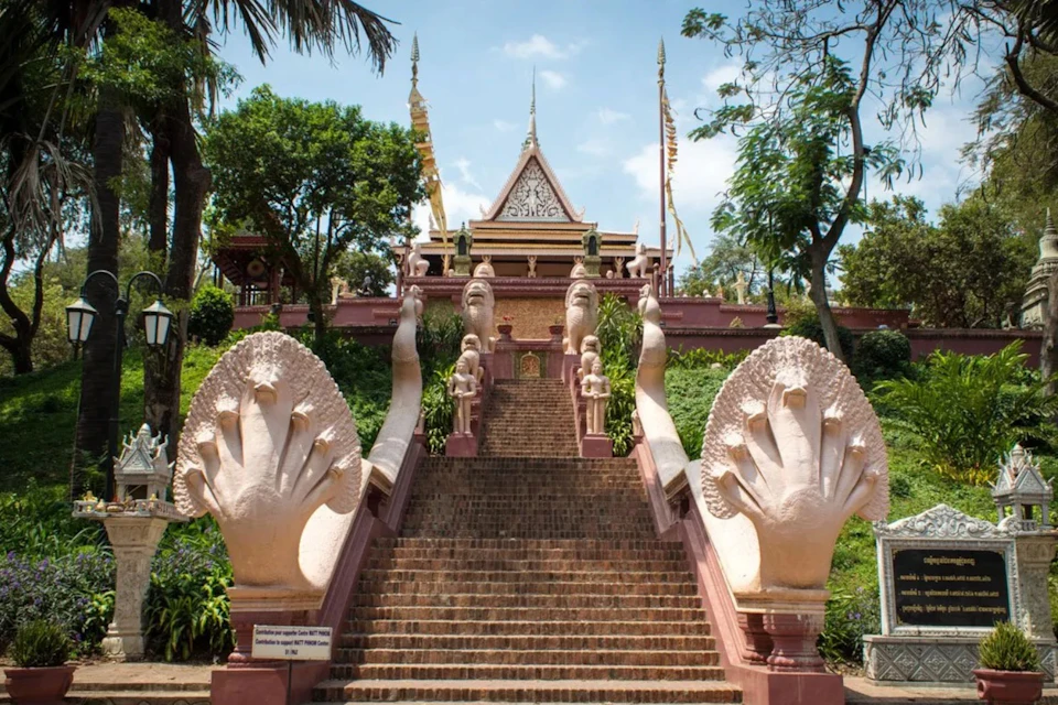 Discover the city of Phnom Penh on the back of a Vespa.