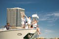 group of people on yacht front deck enjoying morning yacht