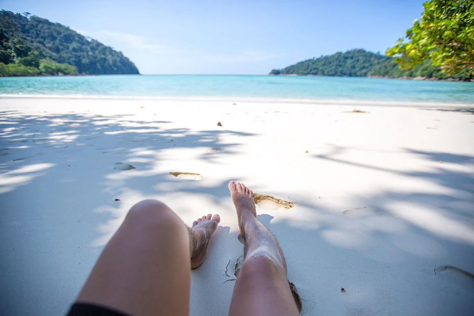 Feel the warm sand beneath your toes, listen to the gentle waves lapping at the shore, and soak up the sun.