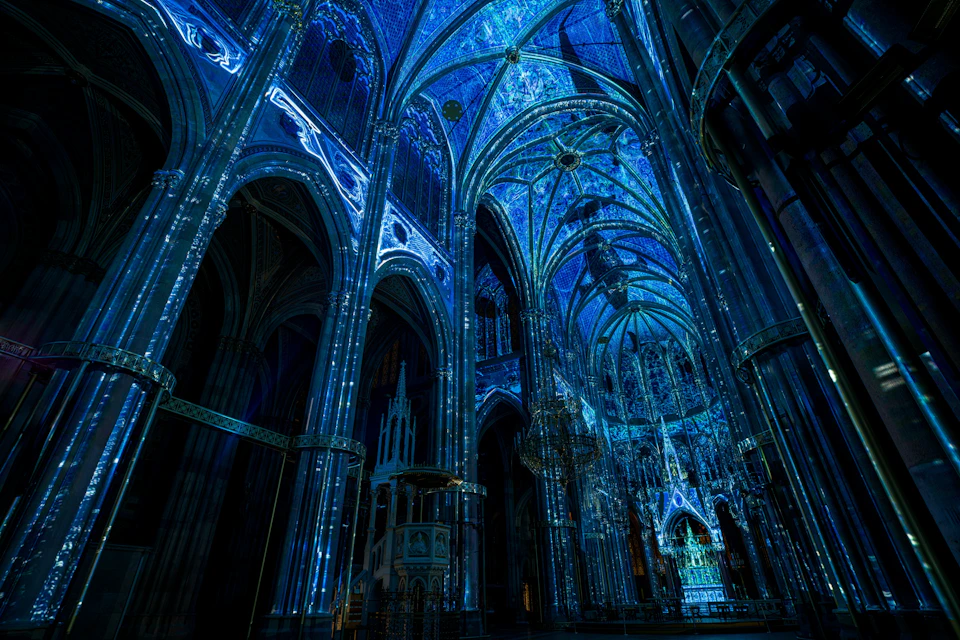 illuminated Votivkirche with whales