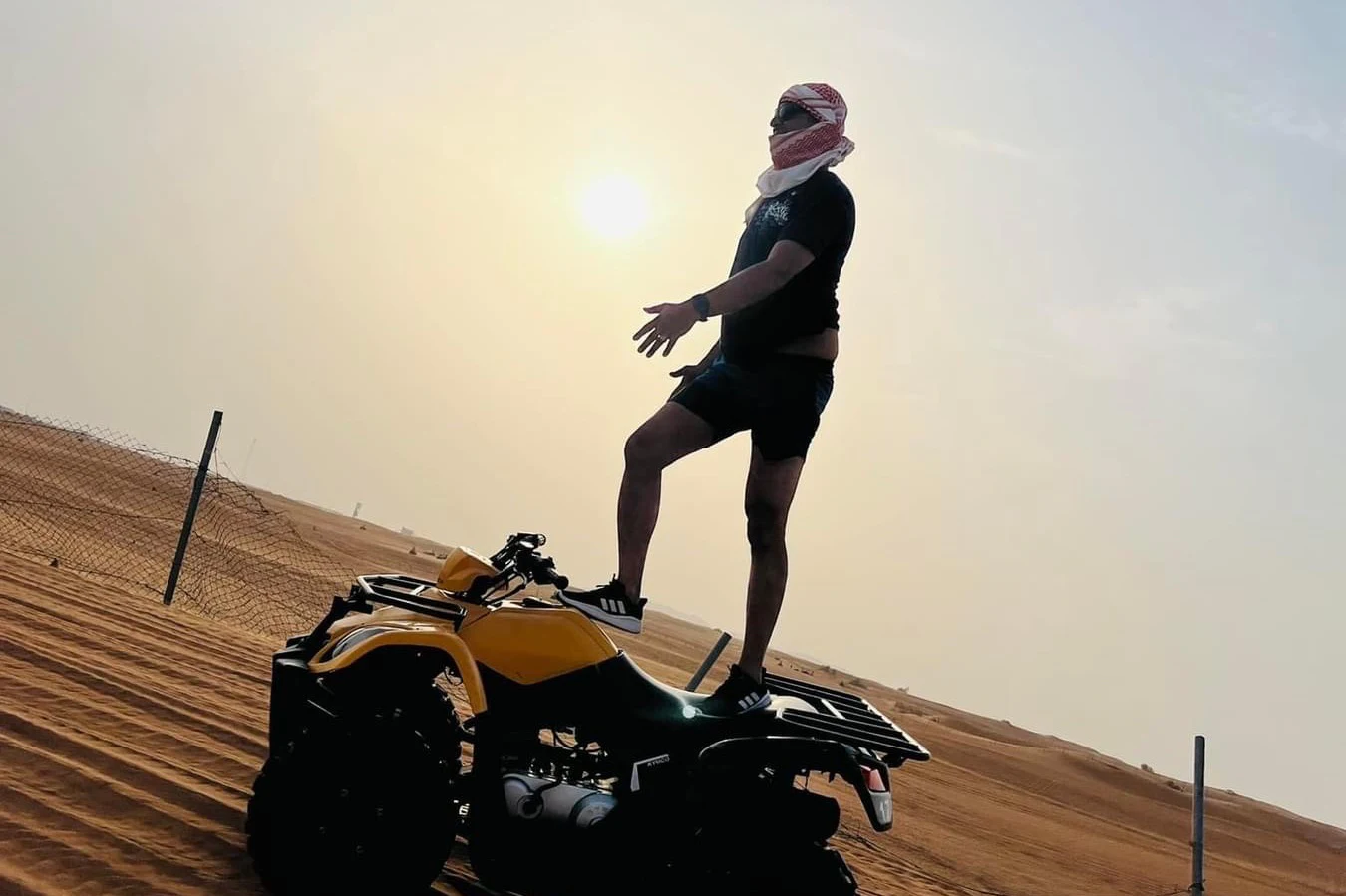 Sunset Desert Safari: Quad Bike, Sandboarding, Camel Ride + BBQ Dinner