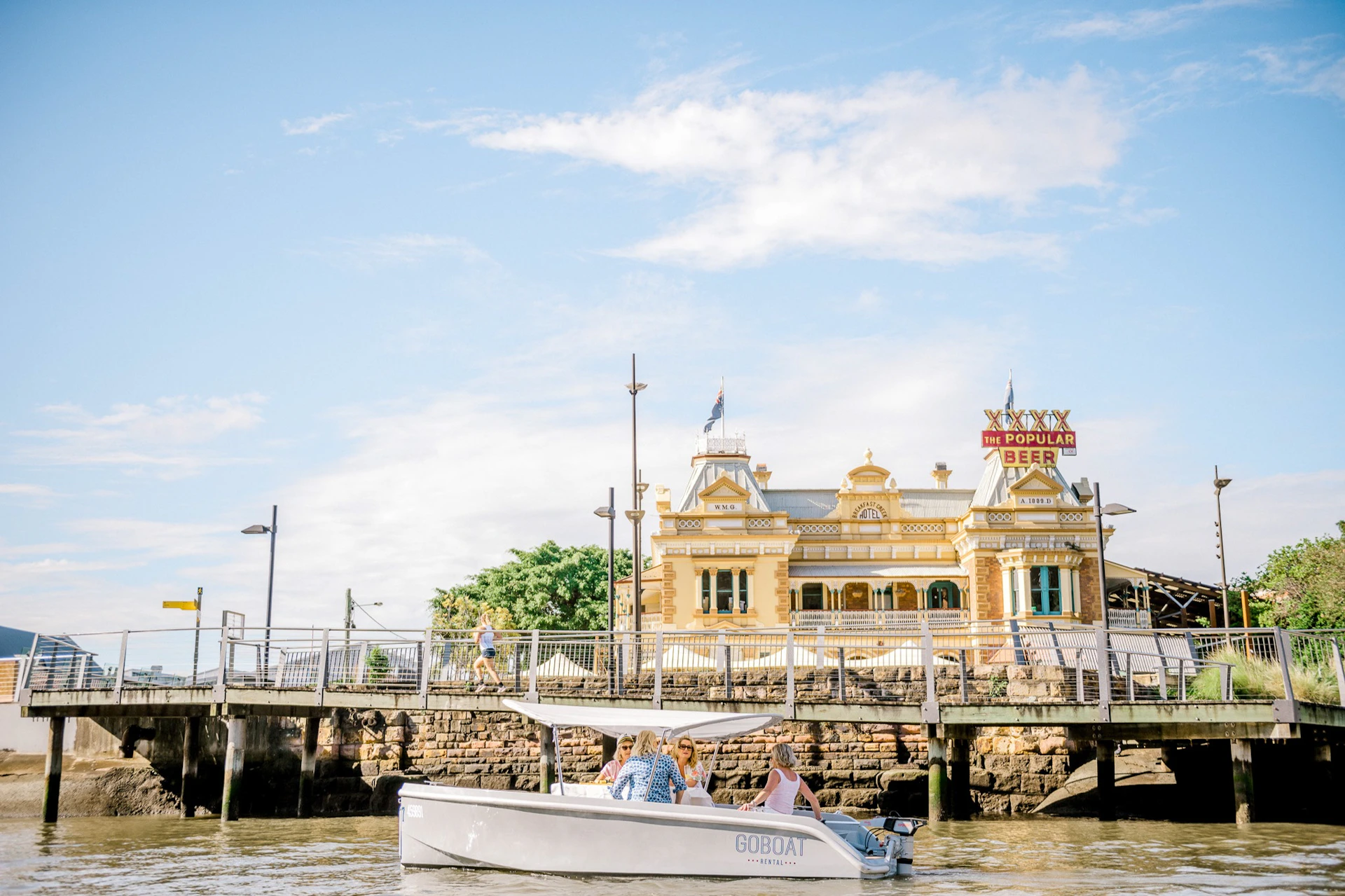 GoBoat sailing past Breakfast Creek Hotel