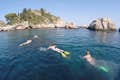 swimming in the crystal clear waters of Isola Bella