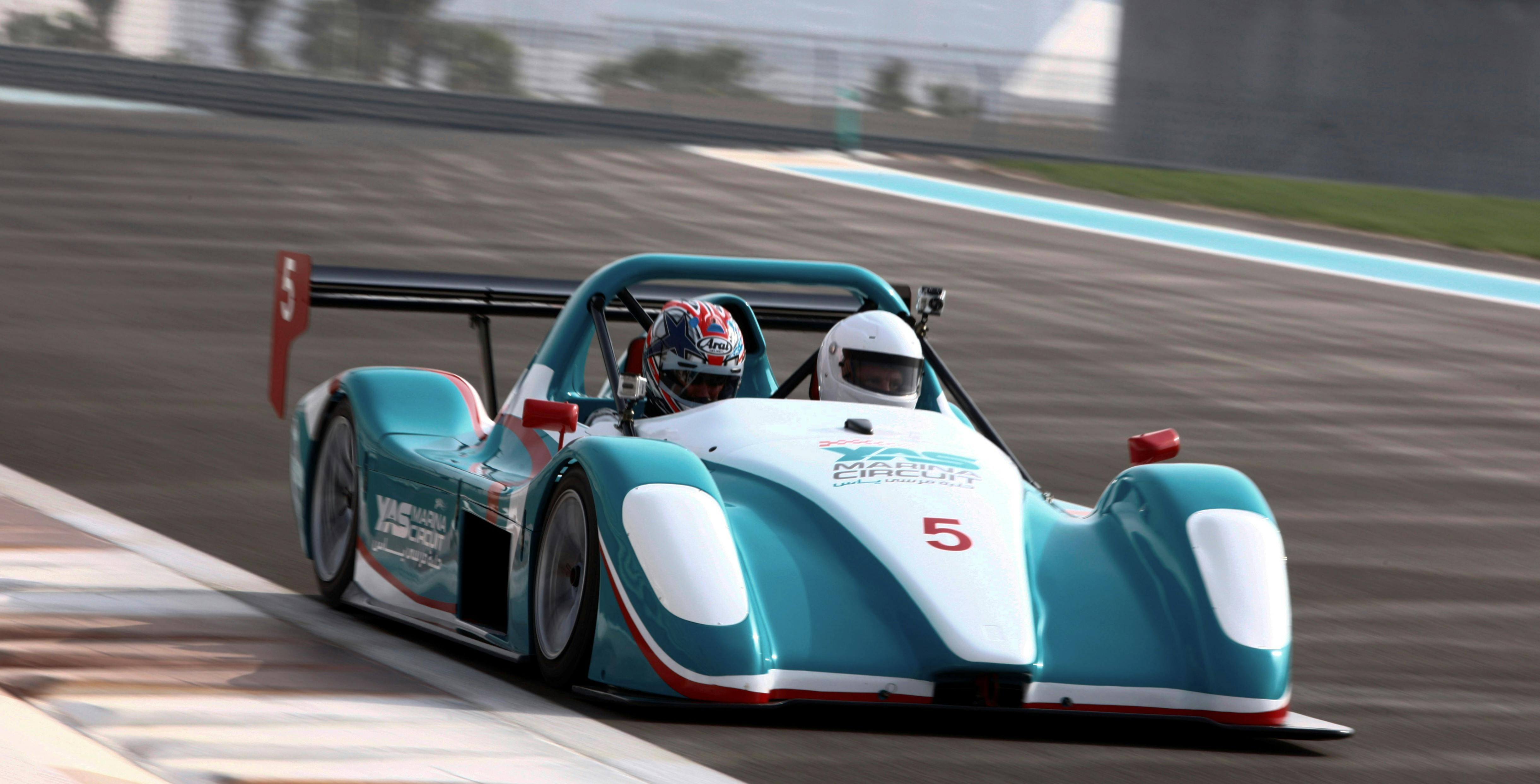 Image of someone enjoying a passenger experience in the racing car
