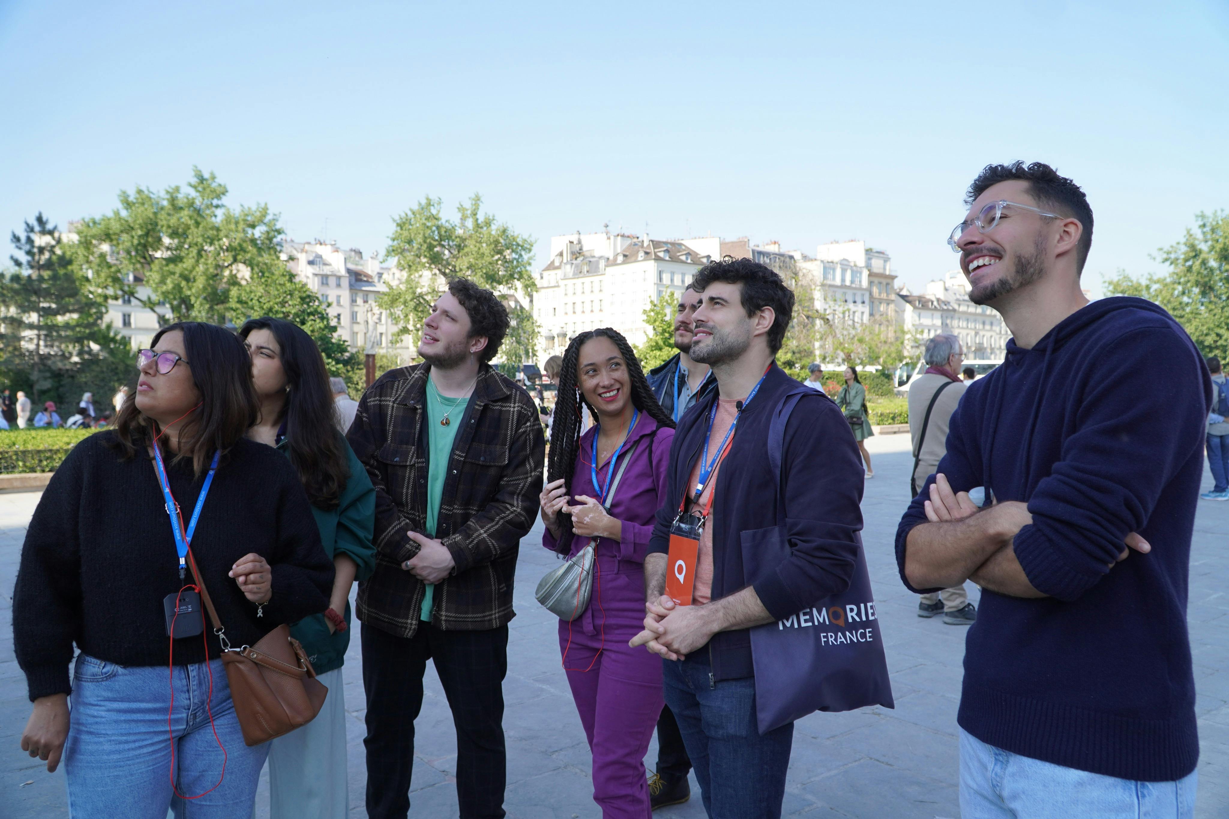 Small group and guide in front of Notre Dame Cathedral