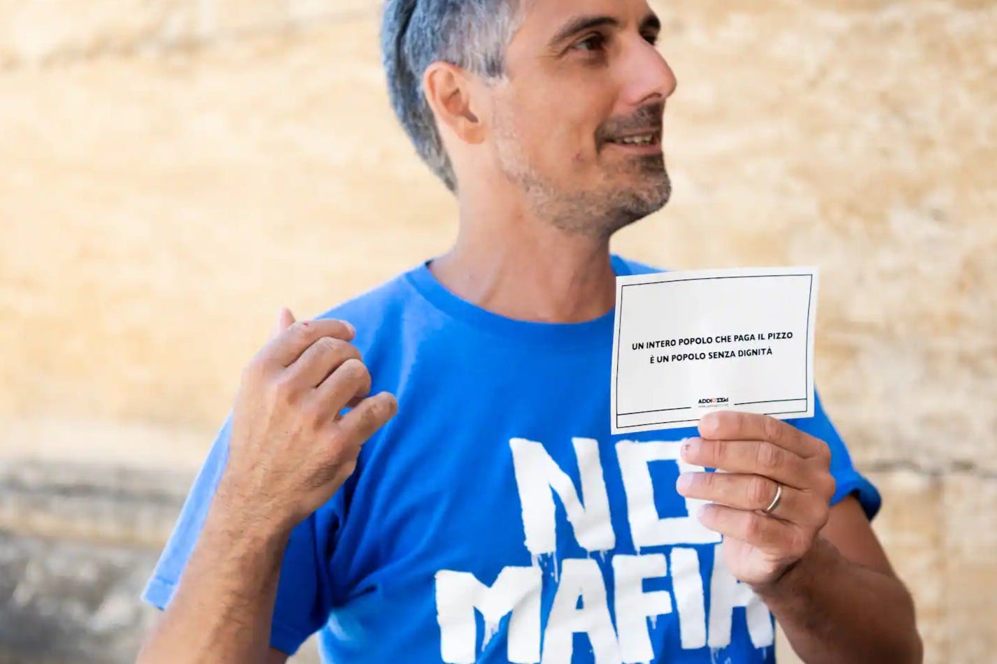 The famous quote from the Addiopizzo Committee: "A people that pays the pizzo is a people without dignity."