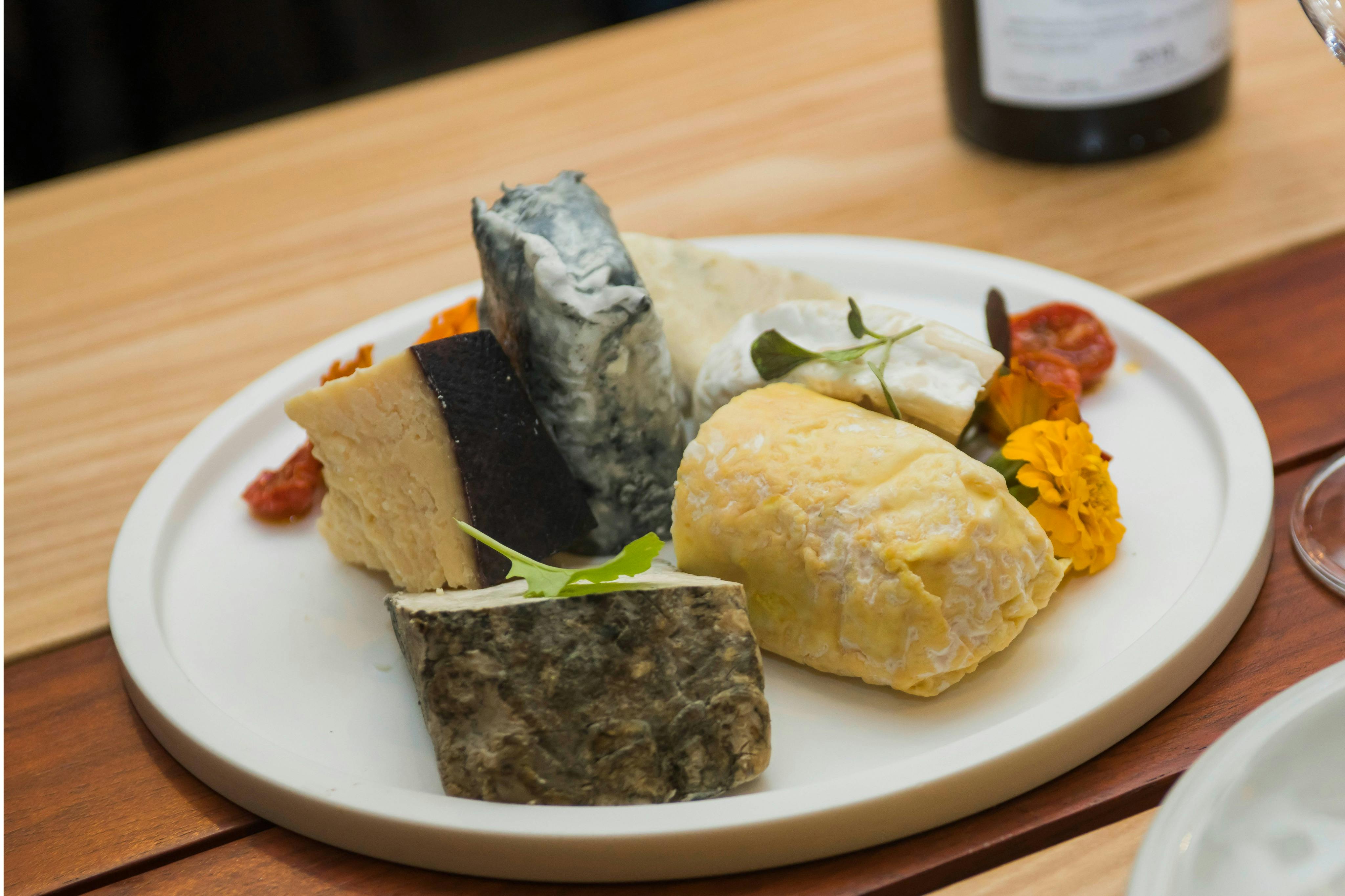 The historic shop on this Roman food tour contains only PGI- protected cheeses of various Italian origins.